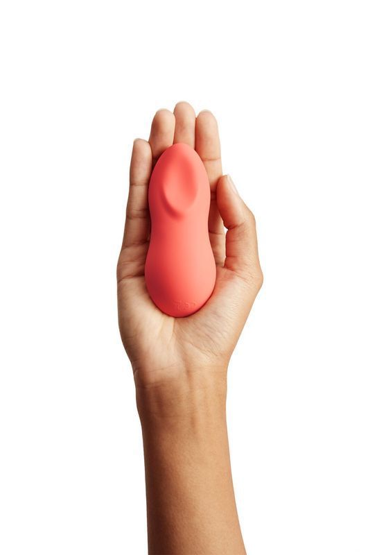 Мощный мини-вибромассажер Touch X Crave Coral by We-Vibe, удобно совмещать с проникающим сексом реальная фотография