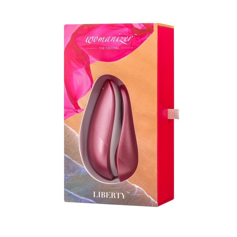 Вакуумный клиторальный стимулятор Womanizer Liberty Pink, магнитная крышка, 2 насадки реальная фотография